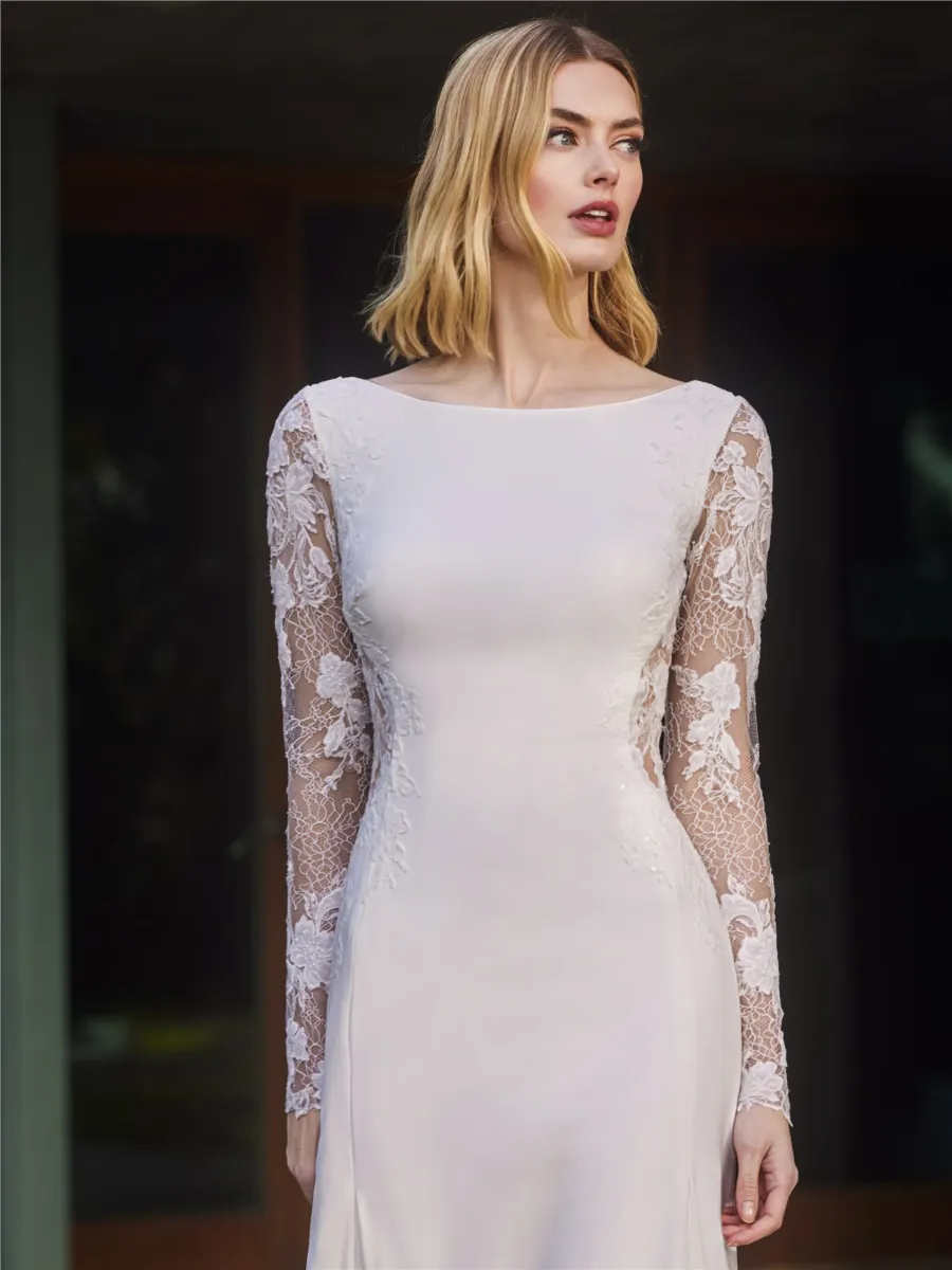 Robe de mariée coupe sirène avec encolure bateau, manches longues tarek pronovias marseille